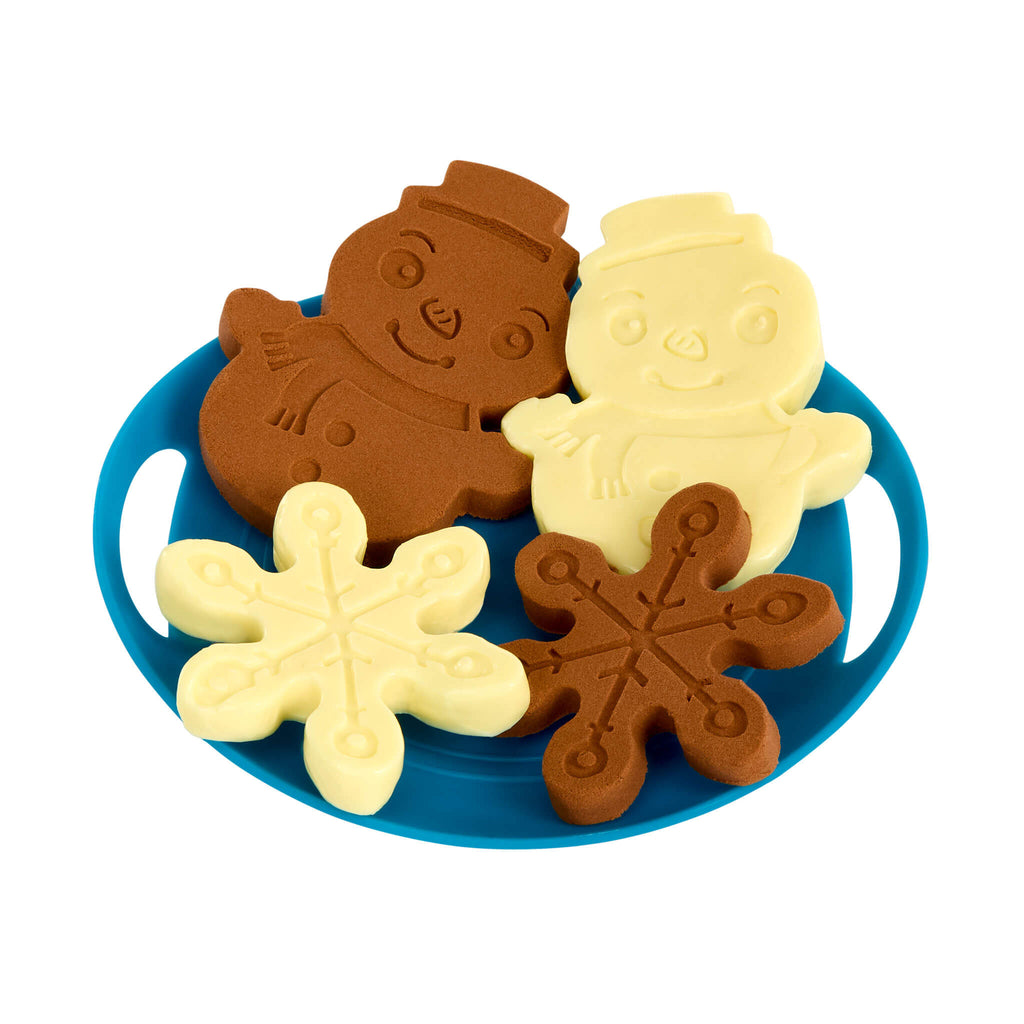 Plate of cookies shaped like snowmen and snowflakes on a blue tray.